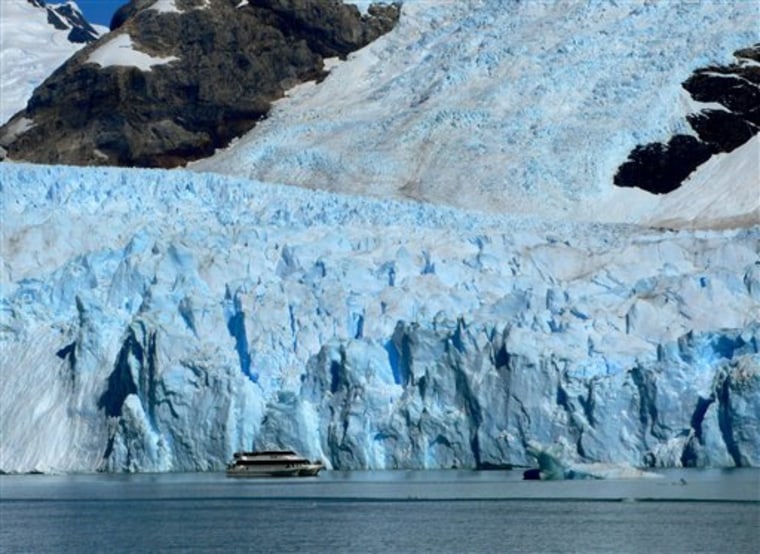 A tour boat passes near the mouth of Spegazzini Glacier on Feb. 23 in Los Glaciares National Park in Argentina. There are dozens of glaciers in the area fed by the Southern Patagonian Ice Field, which blankets a wide swath of the Andes between Chile and Argentina. 